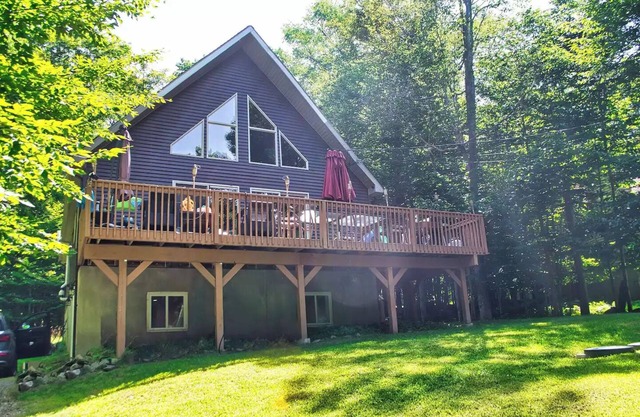 Rustic Modern 5BR/4BA Chalet in Big Bass Lake, a Gold Star gated community.
