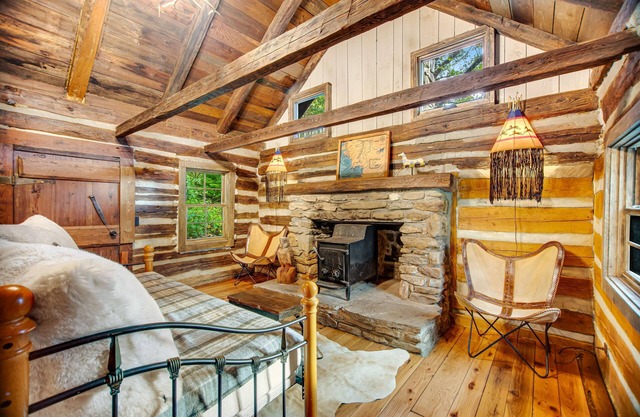 Rustic retreat with wood stove, old-school kitchen, porch, & lovely views
