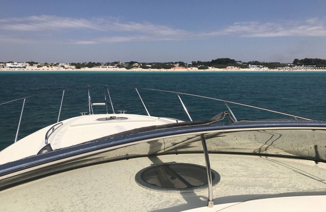 Salento sun in the company of our boat "Sciala Core