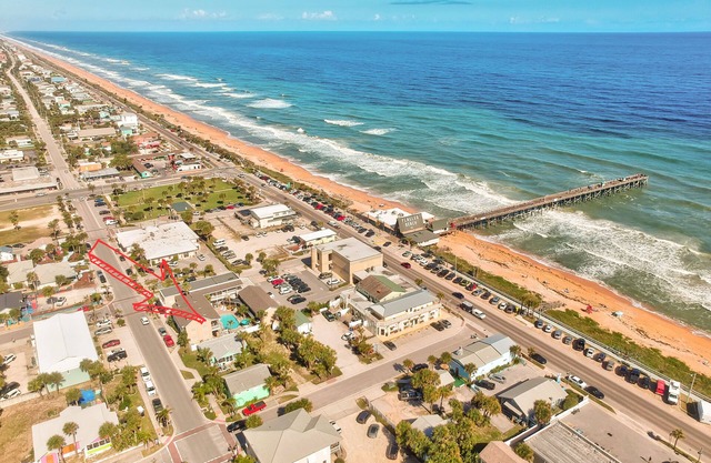 Salty Kisses Seaside Condo just steps to the beach and fishing pier