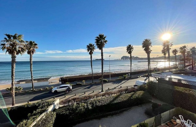 Seafront apartment with private parking