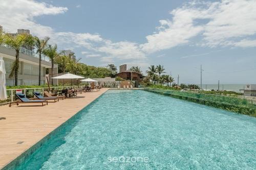 Seafront condominium with pool - SHC