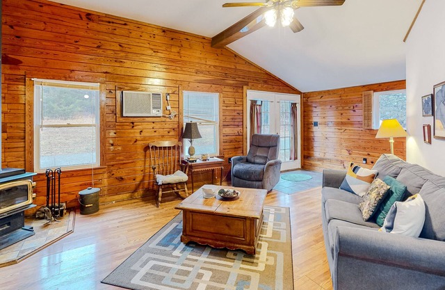 Secluded cabin with a pool, wooded views, pond nearby
