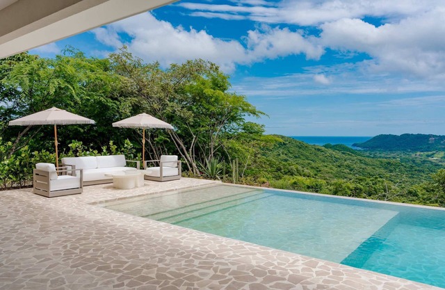 Secluded Luxury Mansion with Sleek, Modern Design, High-End Amenities, and Spect
