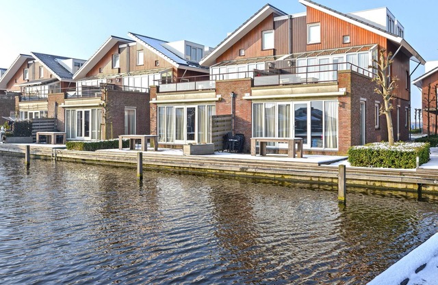 Semi-detached holiday home by the water
