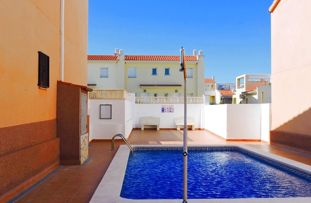 Semi-detached house with community pool in Miami Playa 400 meters from the sea
