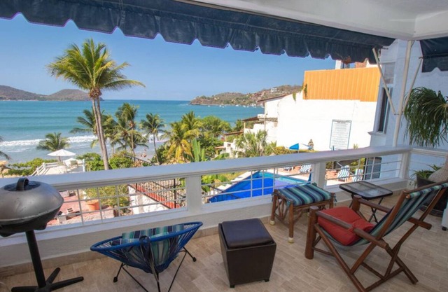 'Simply Perfect' Glorious Location and View Two-Bedroom Ocean/Beach Front Condo