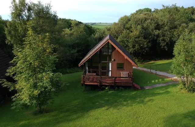 Single storey A-frame lodge.