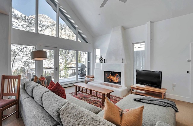 Ski in/ski out to Alta in this bright, breathtaking new home that sleeps 12 with fireplace!