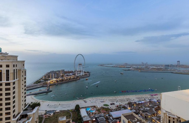 Sky Villa-Exclusive 4Bed Designer Penthouse with Private Pool, Jacuzzi, BBQ & Full Sea, Palm and Dubai Eye View at Jumeirah Beach