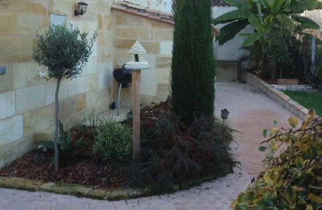 Small cottage both grindstones