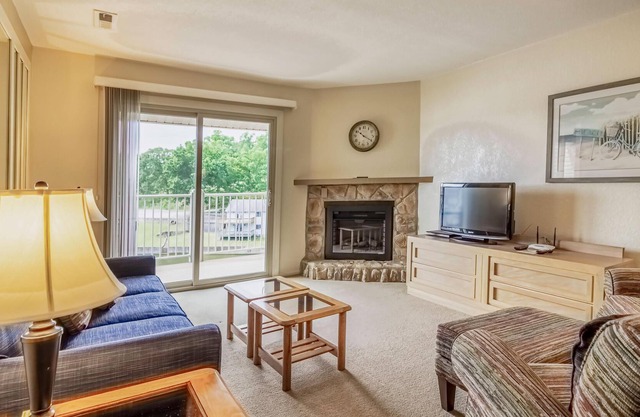 Spacious Condo 102 w/ Full-Sized Kitchen, Grill, & Deck Overlooking the Lake