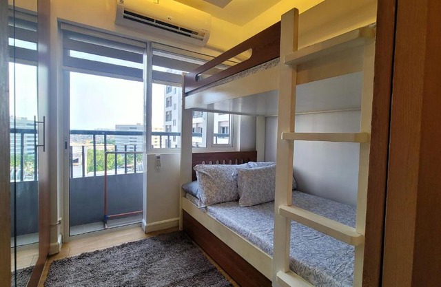 Spacious condo with pool view at Grace Residences, near BGC