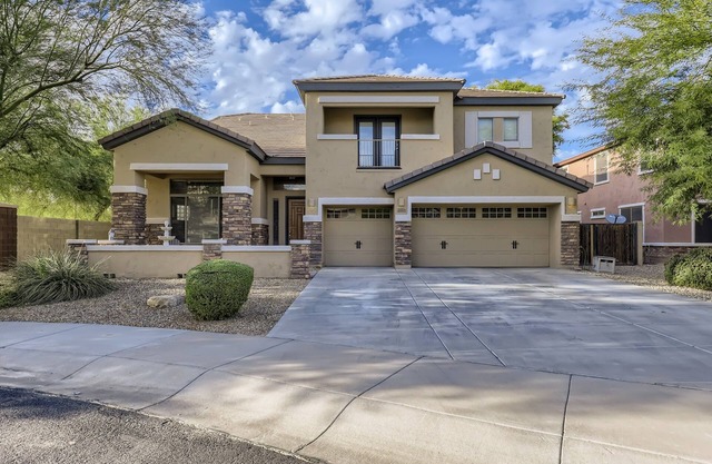 Spacious home in the heart of the West Valley with heated pool and game room