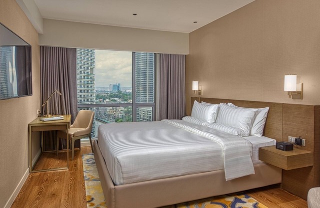 Spacious hotel suites in awesome Mandaluyong with AC, WiFi, fitness room