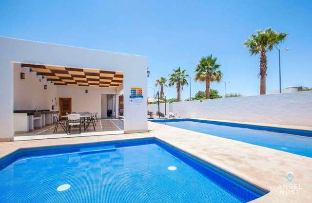 Spacious Townhome with Pool, Yard & Near Malecón!