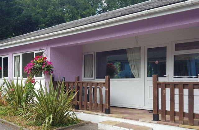 Spacious two bedroom bungalows with one double and a full size bunk bed and single bed.