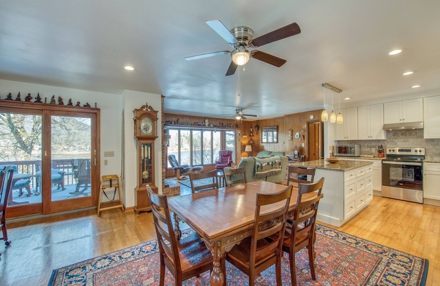 Spacious two-story lakefront home with lake views, balcony, AC, pool & tennis