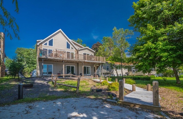 Spacious updated lakefront home with incredible views and personal dock/beach