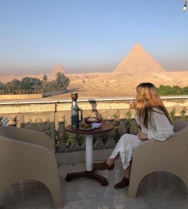 Sphinx palace pyramids view inn