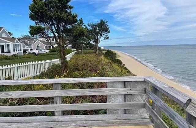 STEP DIRECTLY ONTO YOUR PRIVATE MAUSHOP VILLAGE BEACH AT THIS SEASIDE TOWNHOME