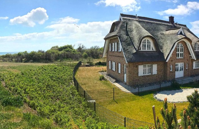 Strandhaus 6 "Düne" in Lobbe mit Meerblick, Kamin, Sauna