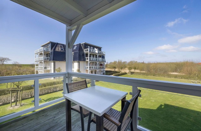 Strandnahe, Hundefreundliche Ferienwohnung mit Sauna und Balkon mit Strandkorb