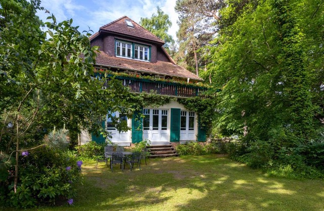 Strandvilla Hubertus Boltenhagen - Ferienwohnung Maisonette Apartment Kandinsky mit seitlichem Meerblick Parkplatz WLAN voll ausgestattete Küche Garten Grillplatz Waldbaden Familie Südlage