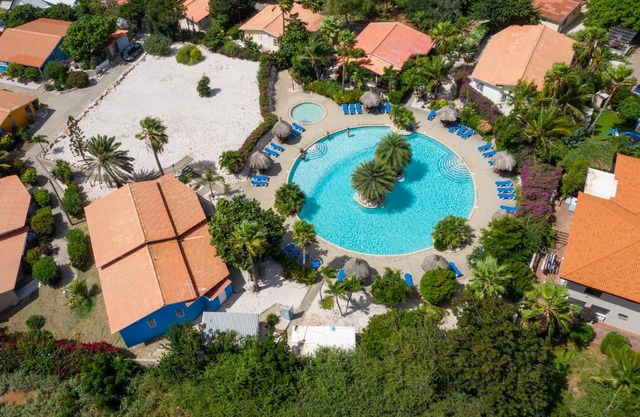 Studio at the pool in tropical Resort Seru Coral with privacy and large pool