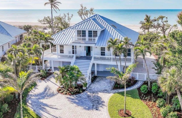 Stunning Beachfront Villa with Heated Pool