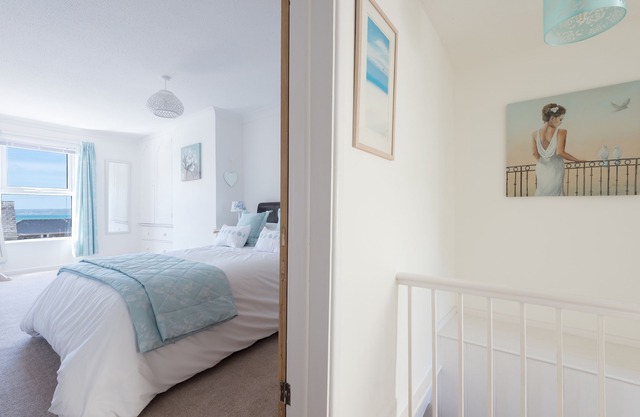 Stunning Beautiful Beamed Cottage right opposite the Beach along with Sea Views