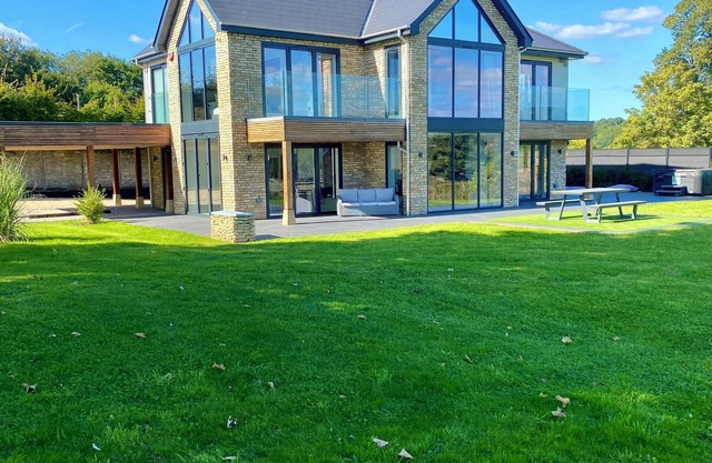 Stunning modern home set in beautiful grounds.