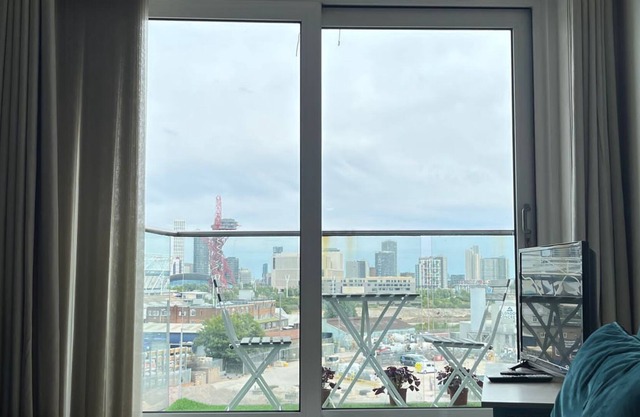 Stunning one bed with rooftop - opposite Stadium