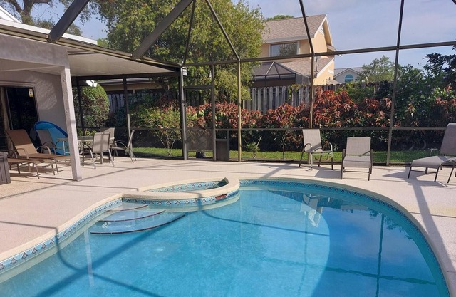 Stunning Private King studio with screened in Pool,new furniture.Near everything