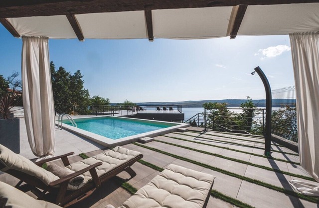 Stunning Villa Grace* with a sea view and a pool in Jadranovo