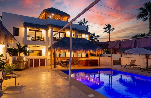 Stunning Villa with a highlight rooftop area, heated pool, balcony, & WIFI