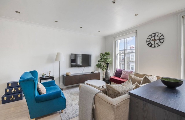 Stylish 2BR Chelsea Penthouse w/Private Rooftop
