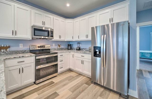 Stylish Townhome w/Balconies & Tesla Charger!