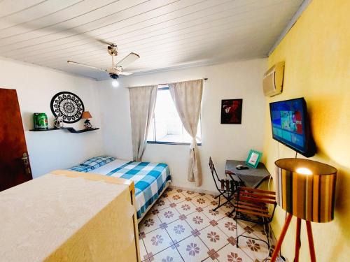 Suíte Casal com Ar TV e Frigobar