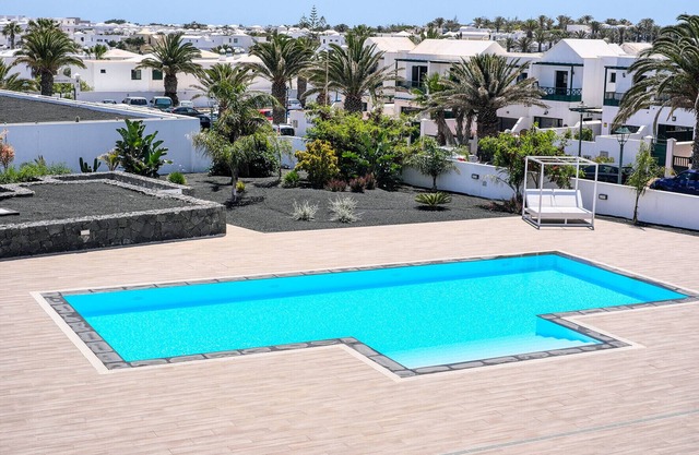 SugarSand Senator in a complex with pool