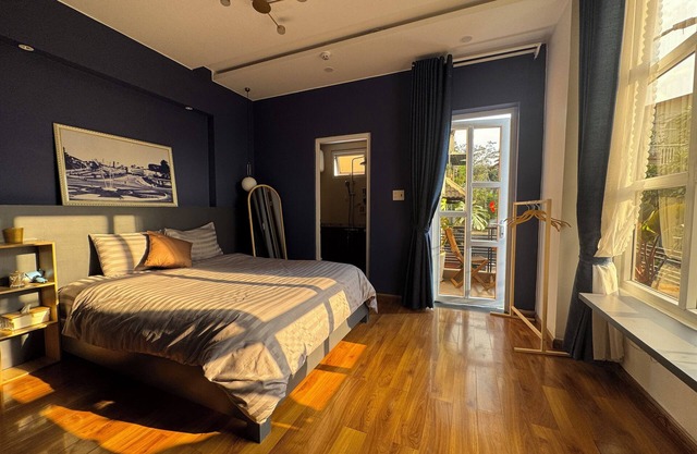 Sunny doubled-balcony hotel suites in the spacious and cozy villa