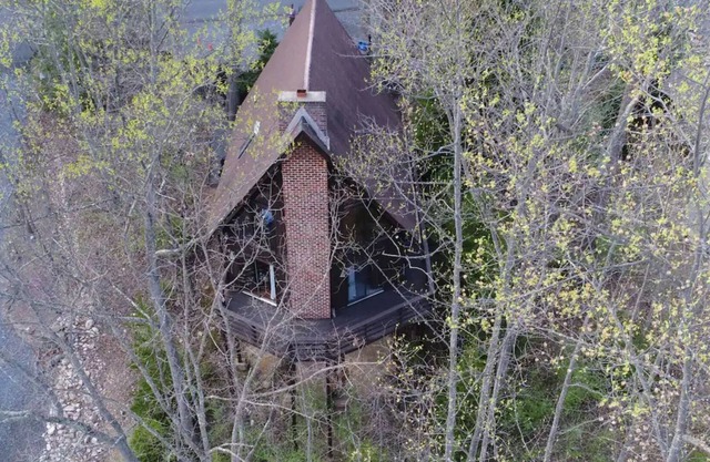 The chalet in the trees