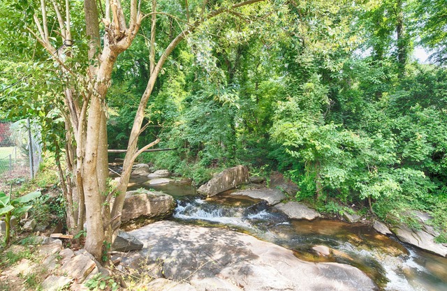 The Creek Housenbeautiful backyard creeknrear find, family friendly.n