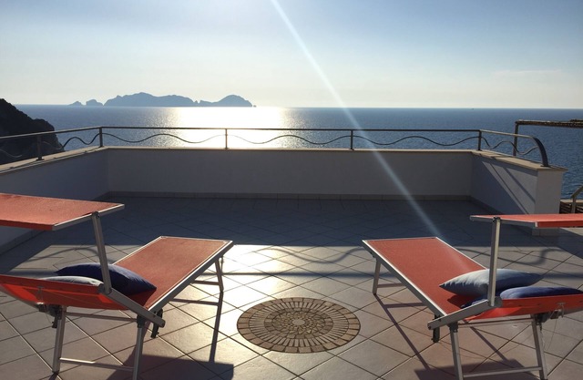 THE FAUN'S HOUSE IN CALA DELL'ACQUA ON THE SEA WITH A VIEW OF PALMAROLA