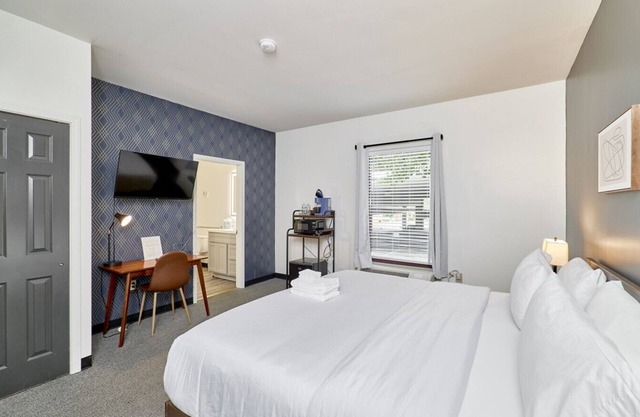The West End Hotel King bed by Cortex, Forest Park & BJC