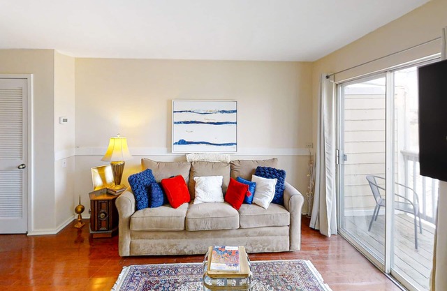 Third-floor riverfront condo with shared pool, fast WiFi, balcony, & central AC