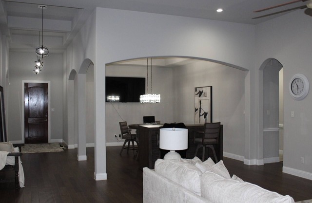 This beautiful 3200 SF single storey with loft backs onto a heavily treed forest