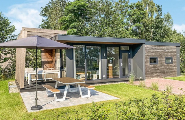 This beautifully decorated vacation home is located in an inviting vacation park, the centerpiece of