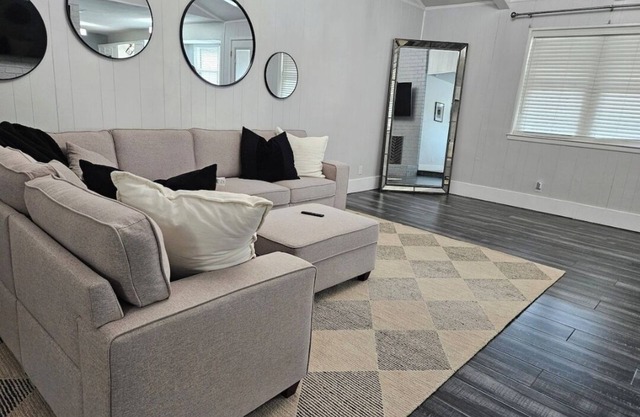 This modern 4-Bedroom features a spacious interior and exquisite backyard.