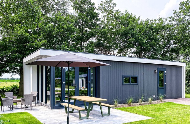 This nicely furnished vacation home is beautifully situated on the edge of an inviting vacation park